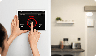 Woman adjusting smart home thermostat using a mobile app for convenient temperature control indoors.